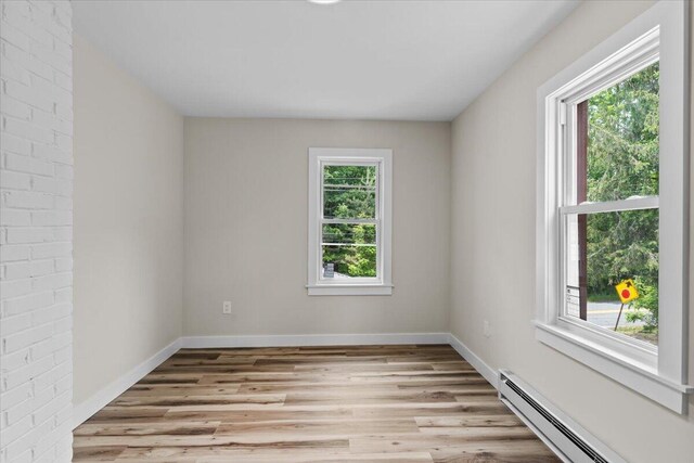 15 Locust Ridge Rd, Thornhurst, PA 18424 - spare room featuring a baseboard radiator and light wood finished floors