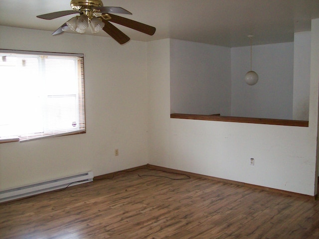 1166 Hunters Woods Dr, East Stroudsburg, PA 18301 - spare room with ceiling fan, a baseboard heating unit, and wood finished floors