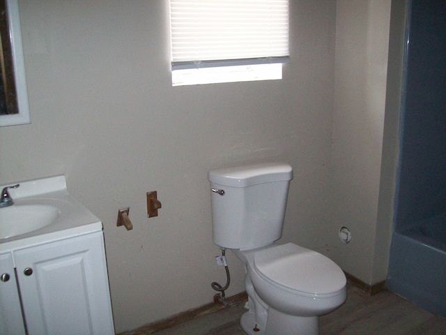 1166 Hunters Woods Dr, East Stroudsburg, PA 18301 - full bathroom featuring a bath, toilet, vanity, and wood finished floors
