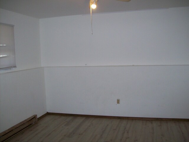 1166 Hunters Woods Dr, East Stroudsburg, PA 18301 - unfurnished room featuring light wood-style flooring, ceiling fan, and baseboards