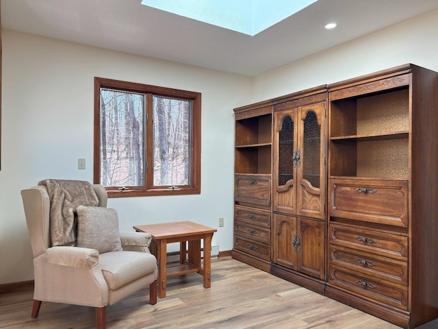 113 Mountainside Dr, Gouldsboro, PA 18424 - living area featuring baseboards, light wood finished floors, and a skylight