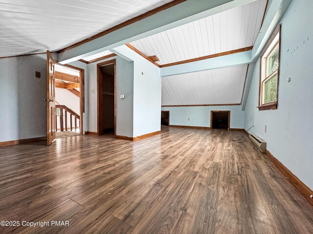 bonus room with lofted ceiling with beams, a baseboard radiator, wood finished floors, and baseboards