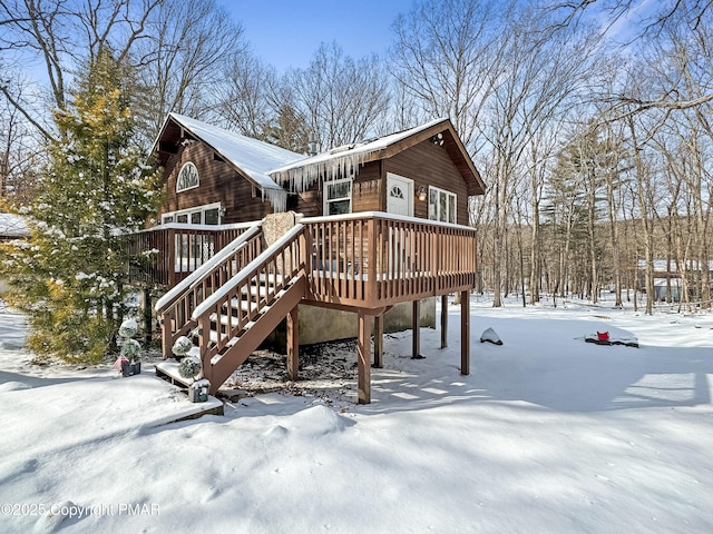 view of front of house with a wooden deck