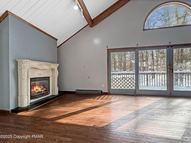 unfurnished living room featuring beam ceiling, a premium fireplace, a baseboard heating unit, high vaulted ceiling, and hardwood / wood-style flooring