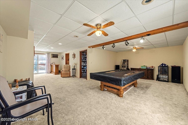 recreation room with ceiling fan, a drop ceiling, carpet, and billiards