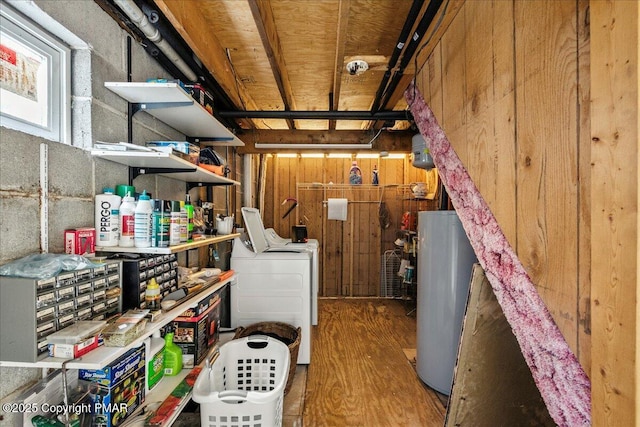 storage featuring washer / dryer and gas water heater