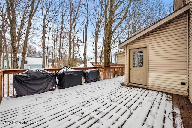 view of snow covered deck