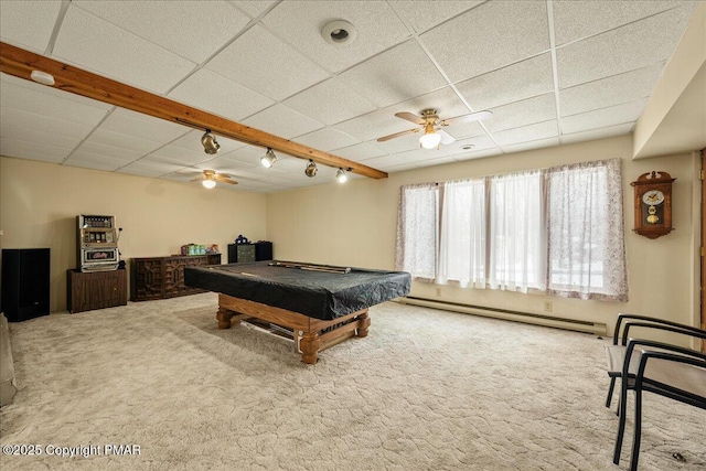 game room featuring a baseboard heating unit, carpet, a paneled ceiling, and track lighting