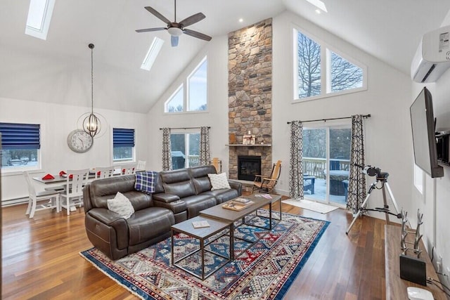 22 Petrarch Trl, Albrightsville, PA 18210 - living room with a skylight, high vaulted ceiling, a wall unit AC, and ceiling fan with notable chandelier
