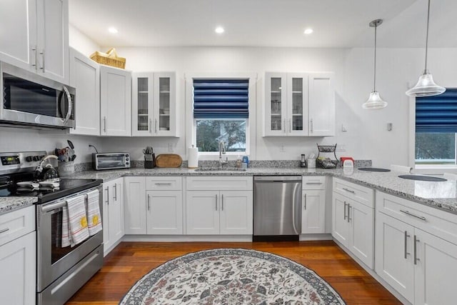 22 Petrarch Trl, Albrightsville, PA 18210 - kitchen with a healthy amount of sunlight, white cabinetry, a sink, and appliances with stainless steel finishes