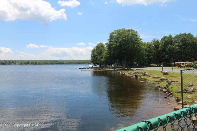 property view of water with fence
