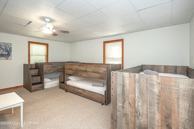 151 S Lake Dr, Lake Harmony, PA 18624 - carpeted bedroom with ceiling fan, a paneled ceiling, and baseboards