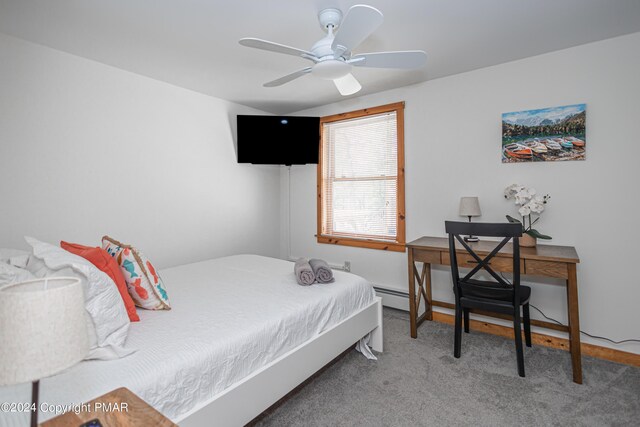 151 S Lake Dr, Lake Harmony, PA 18624 - carpeted bedroom featuring a baseboard heating unit and a ceiling fan