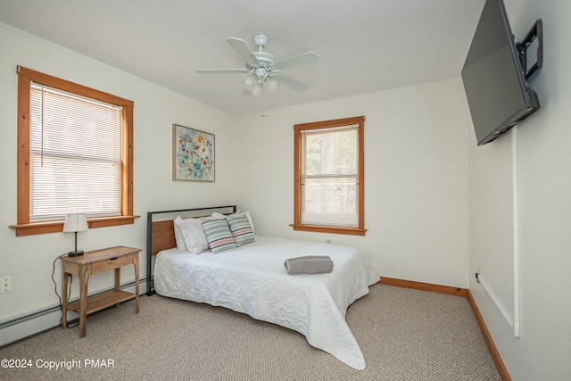 151 S Lake Dr, Lake Harmony, PA 18624 - carpeted bedroom with ceiling fan, baseboards, and baseboard heating