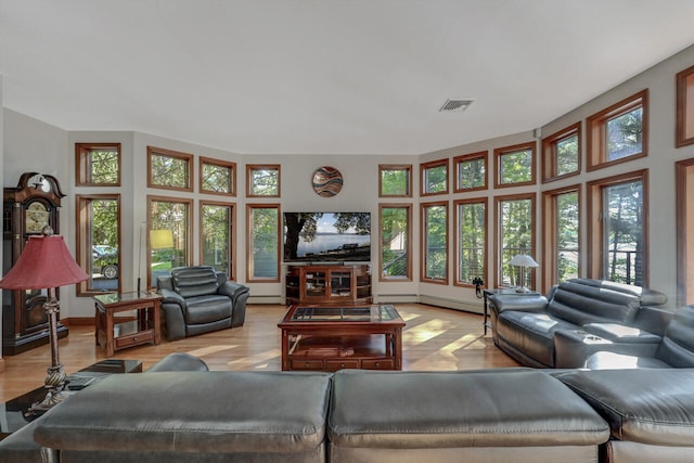 210 Egret Way E, Stroudsburg, PA 18302 - living room with light wood-type flooring and baseboard heating