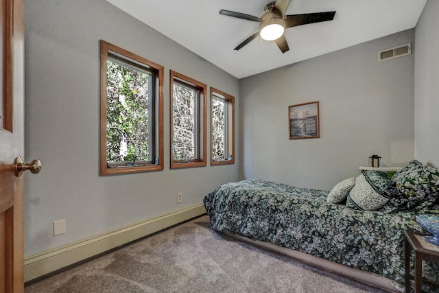 210 Egret Way E, Stroudsburg, PA 18302 - carpeted bedroom featuring baseboards, a baseboard radiator, and ceiling fan