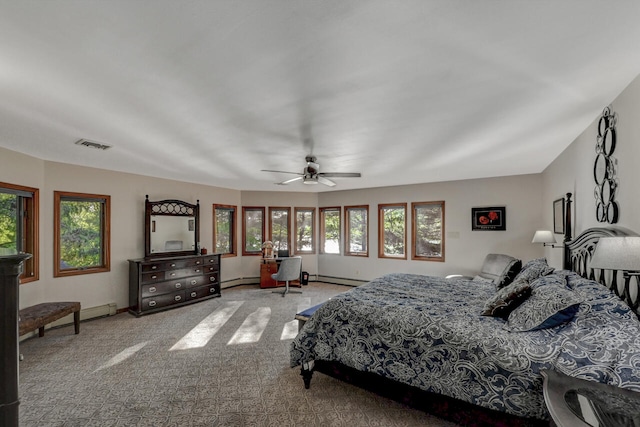 210 Egret Way E, Stroudsburg, PA 18302 - bedroom featuring carpet flooring, a baseboard radiator, baseboards, and a ceiling fan