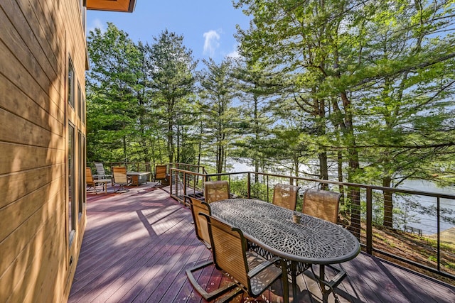 210 Egret Way E, Stroudsburg, PA 18302 - wooden terrace featuring outdoor dining space and a water view