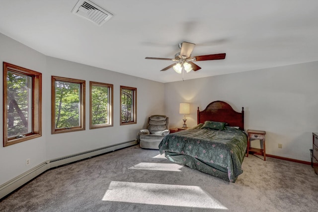 210 Egret Way E, Stroudsburg, PA 18302 - carpeted bedroom with baseboard heating, baseboards, and a ceiling fan