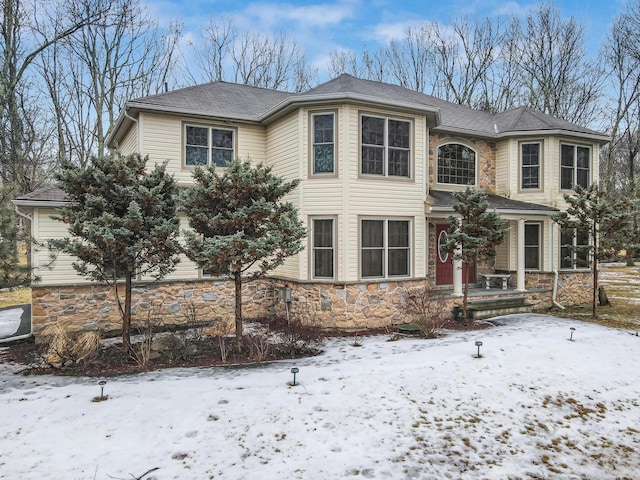 view of front of property featuring stone siding