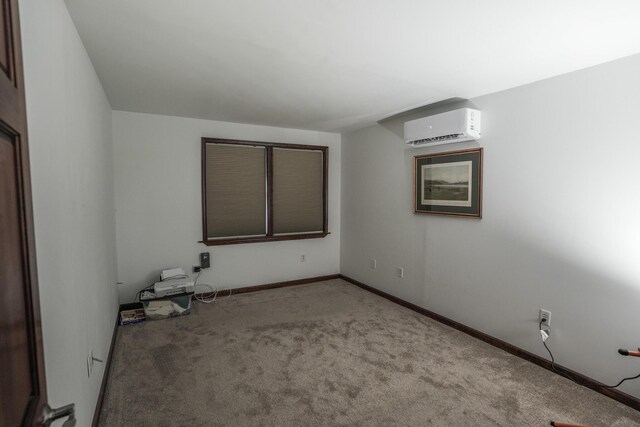 569 Lafayette Ave, Palmerton, PA 18071 - unfurnished room featuring an AC wall unit and carpet floors