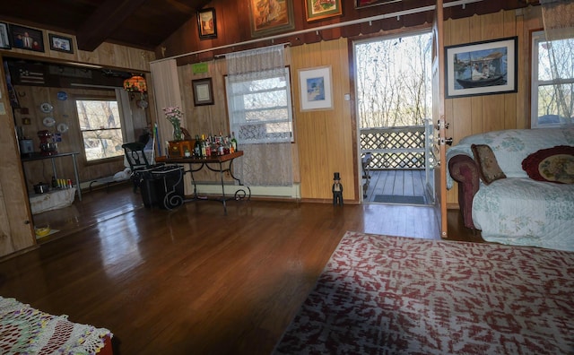 3193 Pine Ridge Dr, Bushkill, PA 18324 - sitting room featuring wooden walls, wood finished floors, and a wealth of natural light
