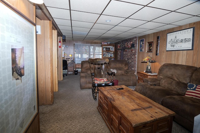 3193 Pine Ridge Dr, Bushkill, PA 18324 - living area with a drop ceiling, wood walls, and dark colored carpet