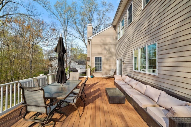 255 Rising Meadow Way E, Stroudsburg, PA 18302 - wooden terrace with an outdoor hangout area and outdoor dining space