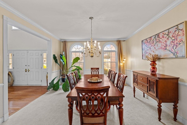 255 Rising Meadow Way E, Stroudsburg, PA 18302 - carpeted dining room with a chandelier and crown molding