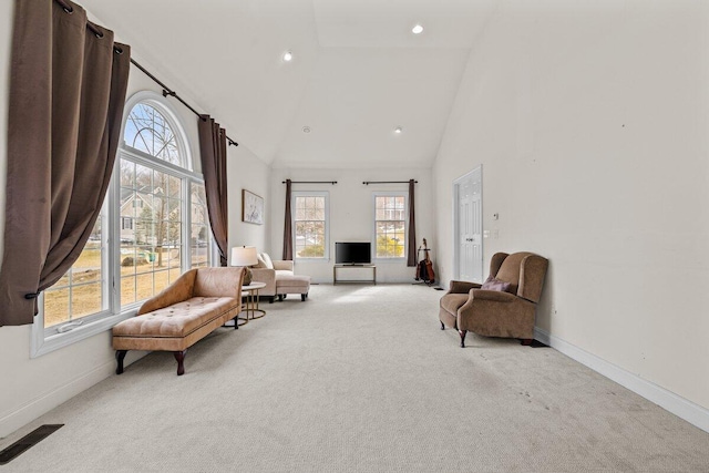 255 Rising Meadow Way E, Stroudsburg, PA 18302 - sitting room with carpet, high vaulted ceiling, plenty of natural light, and recessed lighting