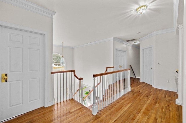 255 Rising Meadow Way E, Stroudsburg, PA 18302 - entryway featuring crown molding and wood finished floors