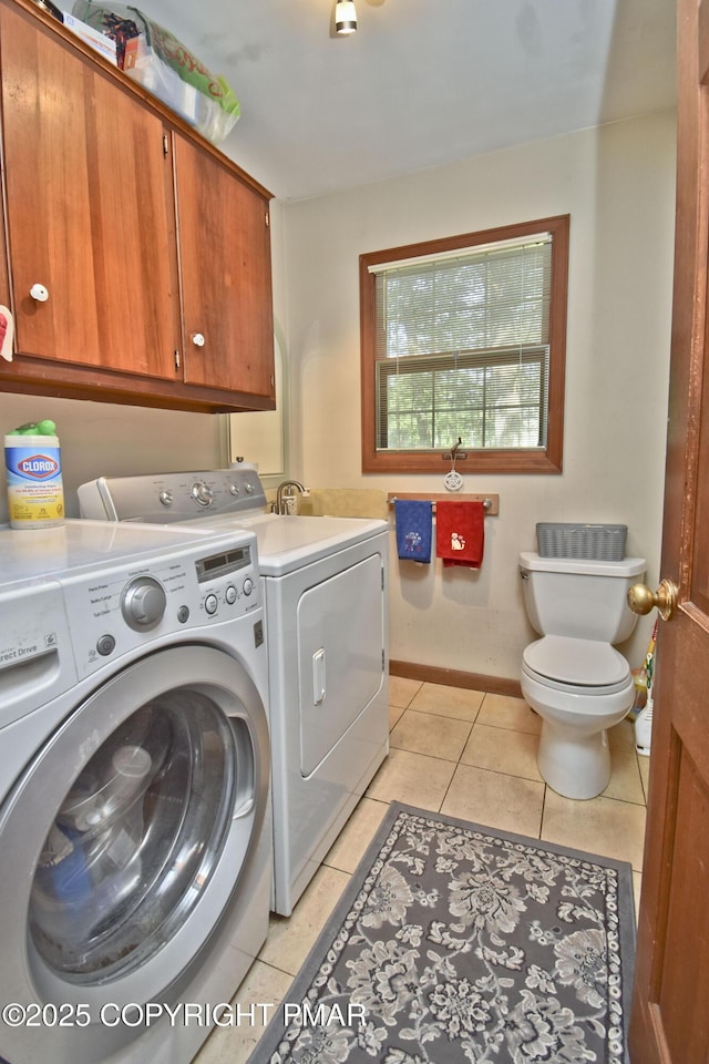 4462 Woodside Dr, East Stroudsburg, PA 18301 - washroom featuring washing machine and dryer and light tile patterned floors