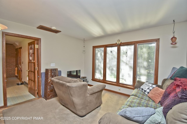 4462 Woodside Dr, East Stroudsburg, PA 18301 - living area with baseboards and light carpet