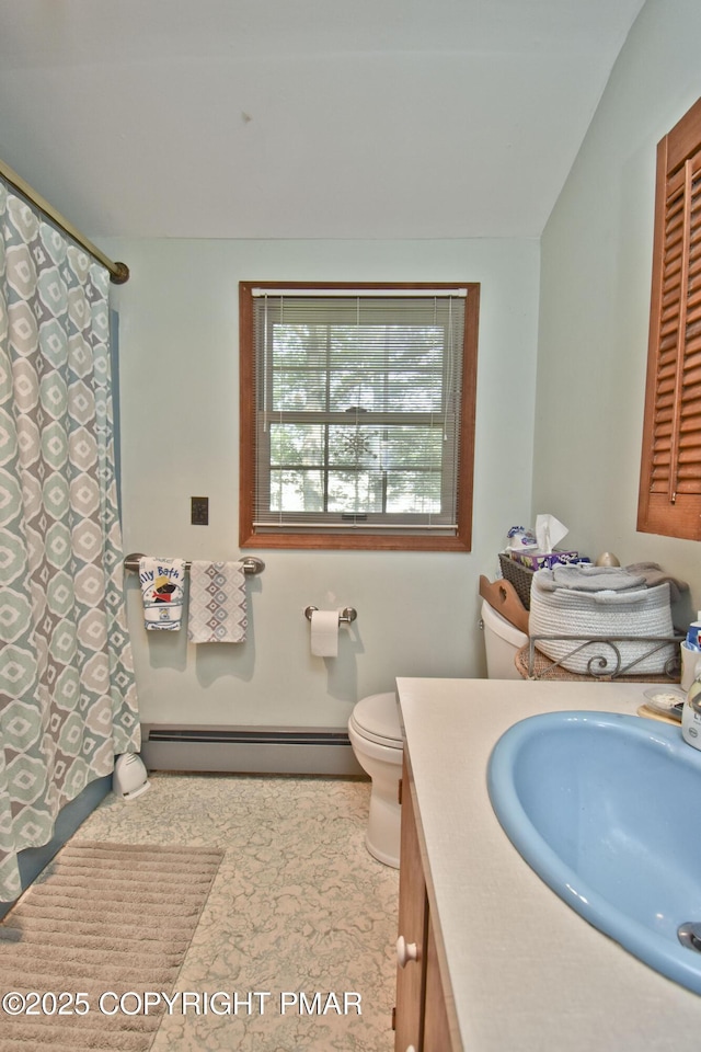 4462 Woodside Dr, East Stroudsburg, PA 18301 - full bath with vanity, a baseboard radiator, and a shower with shower curtain