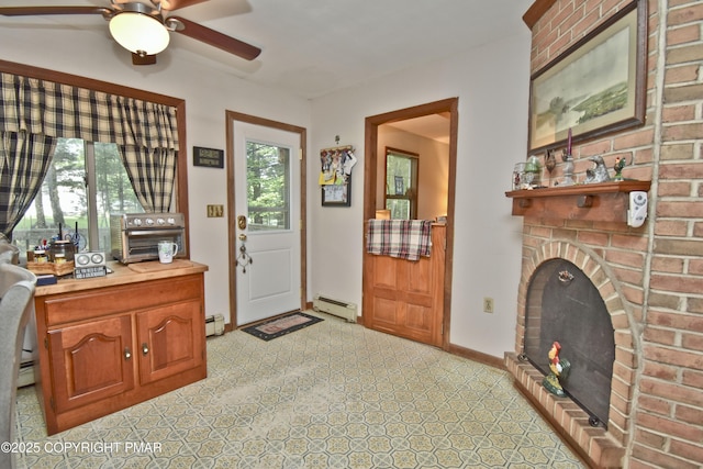4462 Woodside Dr, East Stroudsburg, PA 18301 - entrance foyer featuring a ceiling fan and a baseboard radiator