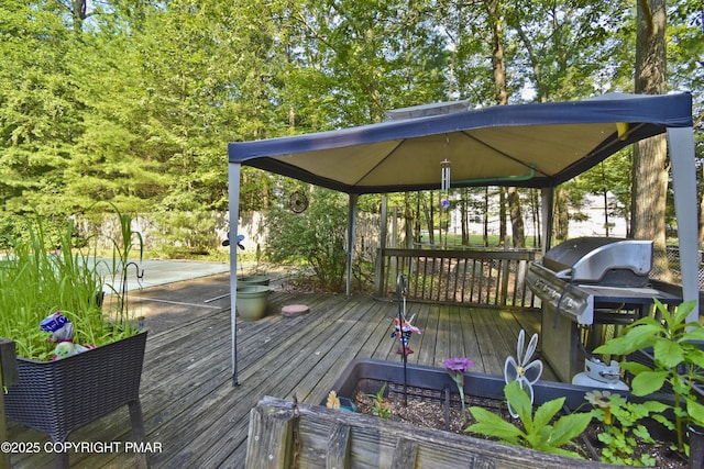 4462 Woodside Dr, East Stroudsburg, PA 18301 - wooden terrace featuring a gazebo and grilling area