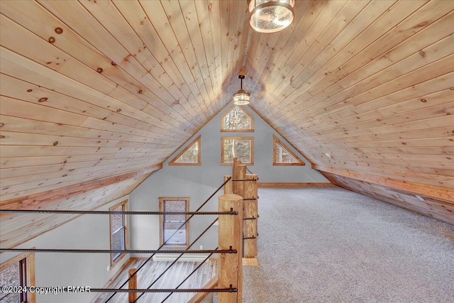 bonus room with vaulted ceiling, carpet flooring, and wood ceiling