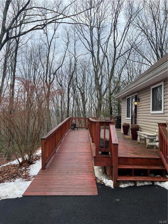 view of snow covered deck