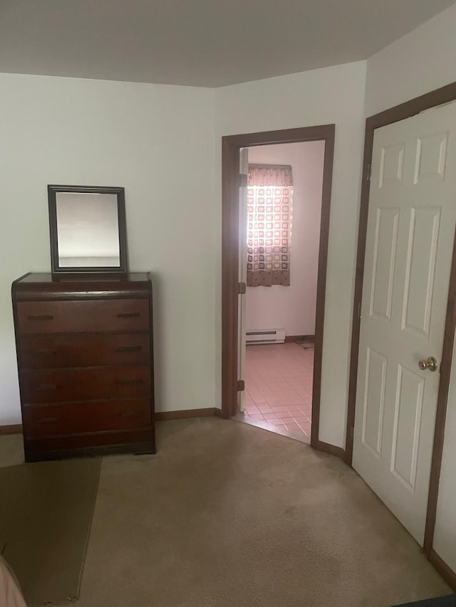 2852 Oak View Ln, Tobyhanna, PA 18466 - carpeted bedroom featuring a baseboard heating unit and ensuite bath
