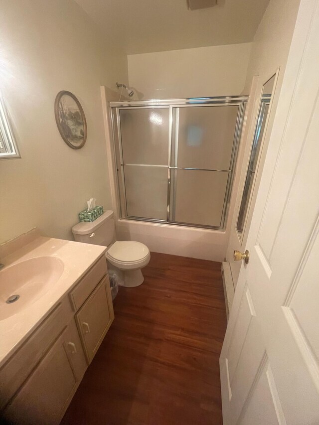 2852 Oak View Ln, Tobyhanna, PA 18466 - bathroom with vanity, wood finished floors, and enclosed tub / shower combo