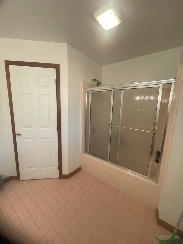 2852 Oak View Ln, Tobyhanna, PA 18466 - bathroom featuring combined bath / shower with glass door and tile patterned floors