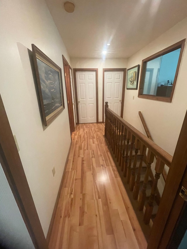 2852 Oak View Ln, Tobyhanna, PA 18466 - corridor featuring light wood finished floors and an upstairs landing