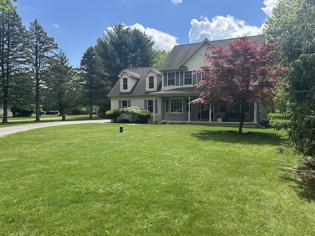 view of front of home with a front lawn