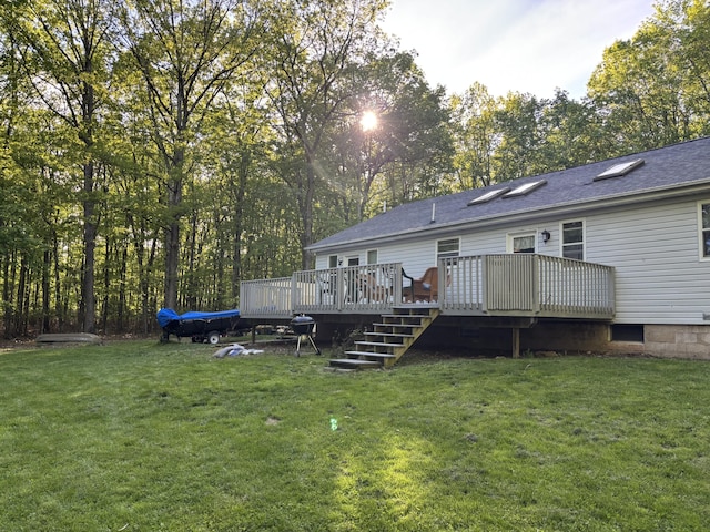 462 Plane St, Weatherly, PA 18255 - rear view of property featuring a deck, a lawn, and a shingled roof