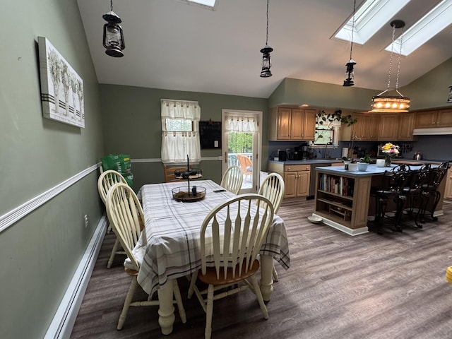 462 Plane St, Weatherly, PA 18255 - dining room with a skylight, light wood-type flooring, baseboard heating, and high vaulted ceiling