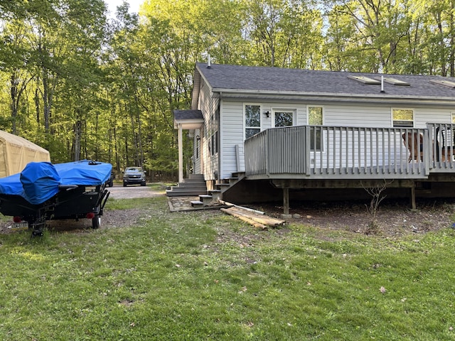 462 Plane St, Weatherly, PA 18255 - rear view of house with a lawn, a wooden deck, and roof with shingles