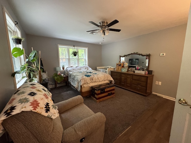 462 Plane St, Weatherly, PA 18255 - bedroom featuring a baseboard heating unit, wood finished floors, ceiling fan, and baseboards