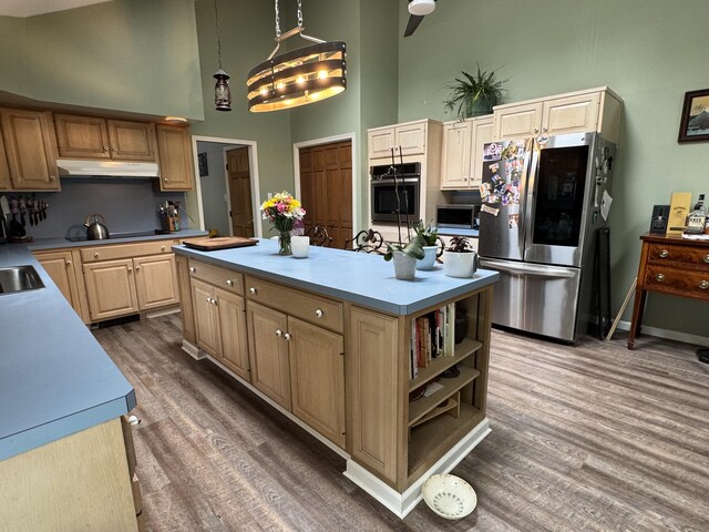 462 Plane St, Weatherly, PA 18255 - kitchen featuring stainless steel appliances, high vaulted ceiling, a kitchen island, wood finished floors, and light brown cabinets