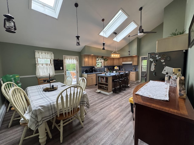 462 Plane St, Weatherly, PA 18255 - dining space featuring a skylight, high vaulted ceiling, light wood-style flooring, and ceiling fan