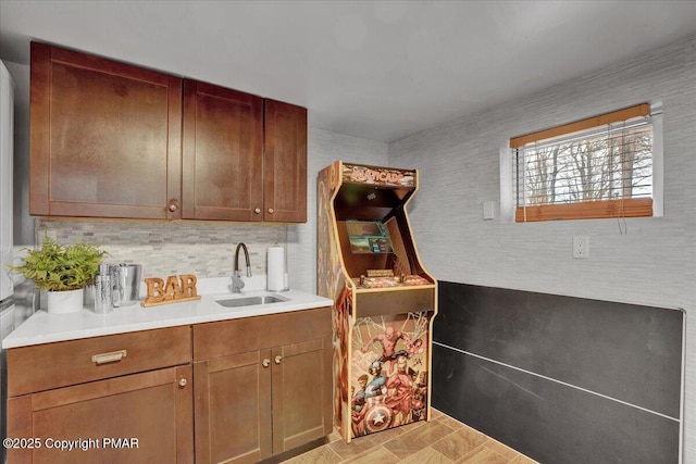 kitchen with sink and decorative backsplash